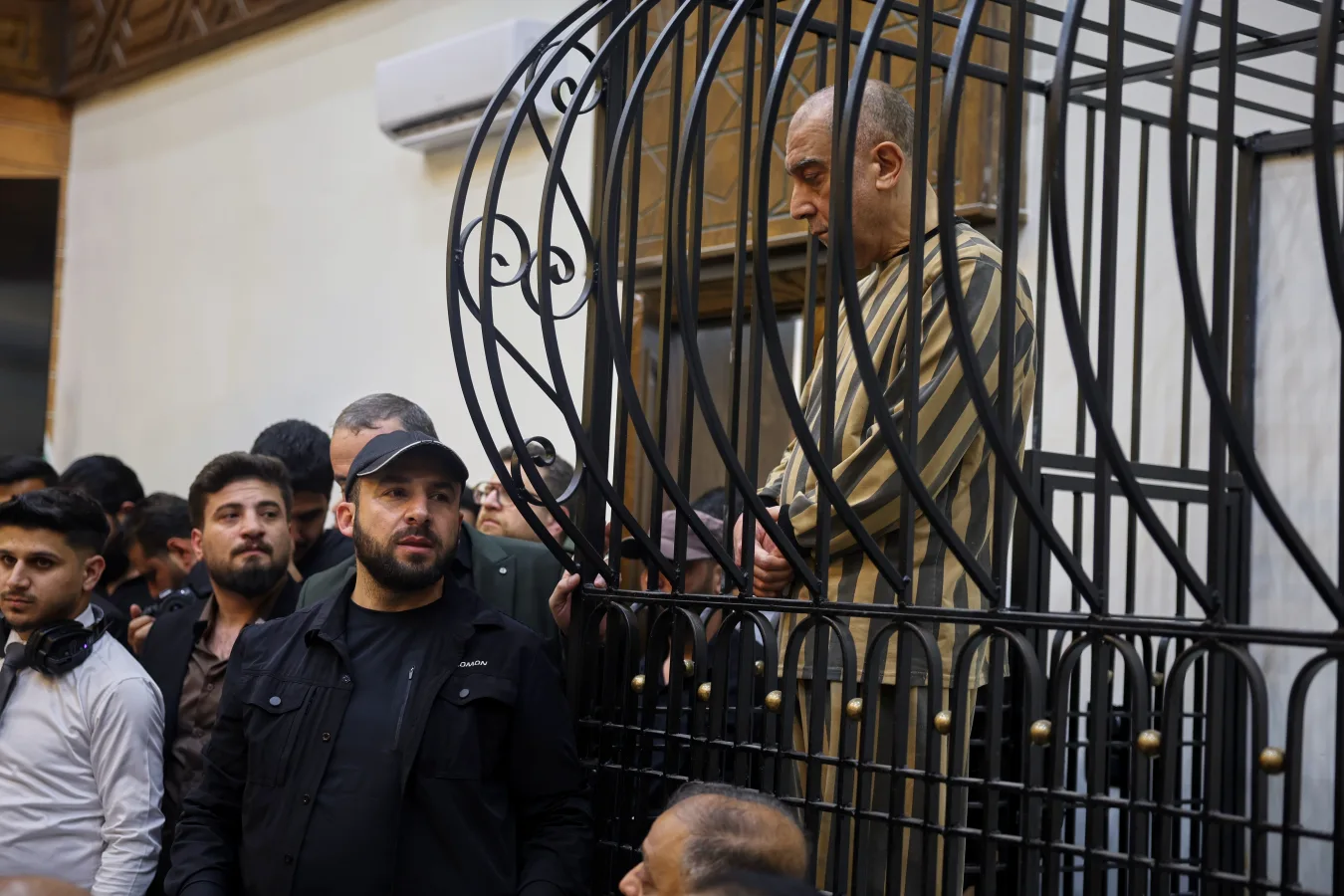 Imagem relacionada à família Assad e aos julgamentos na Síria